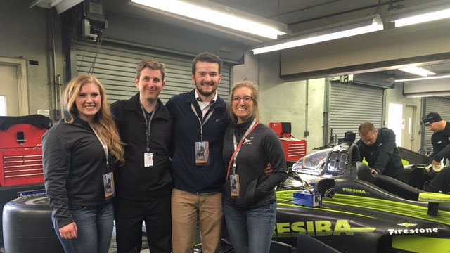 Four Spartans from the Spartan Motorsports Research Lab pose for a picture