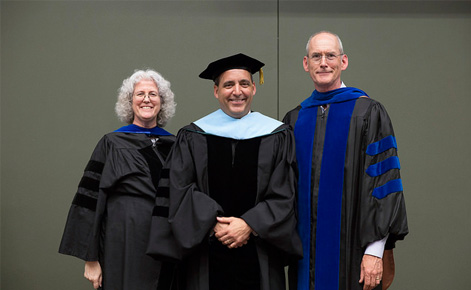 David Arsen (far right), along with Marilyn Amey, chairperson of the Department of Educational Administration, and a 2015 graduate of the DEL program.