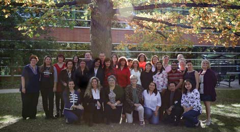 The cohort of Argentinian educators and MSU scholars gathers for a photo outside of Erickson Hall. 