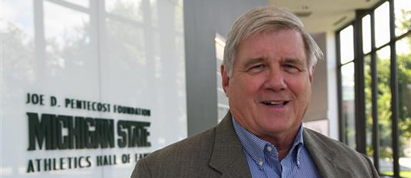 Dan Gould smiles in the MSU Athletic Hall of Fame