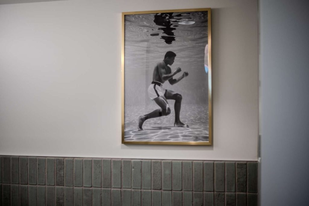 A portrait of Muhammed Ali in the hallway of Detroit Achievement Academy.