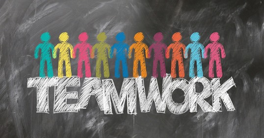 Image of a chalkboard with the word teamwork written on it.