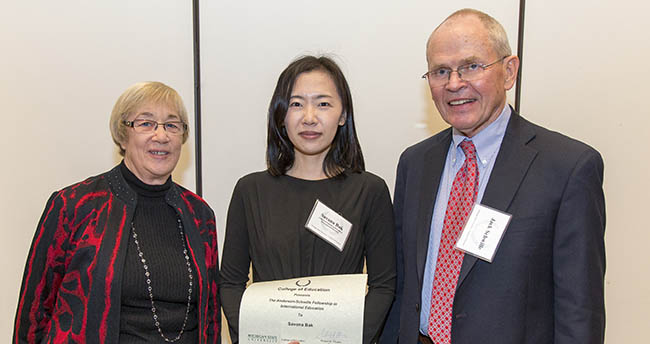 Jack and Sharon Schwille pose with Savana Bak (middle) at the Supporting Spartan Scholars event, Kellogg Center, MSU campus