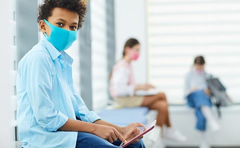 Students wearing masks in school setting