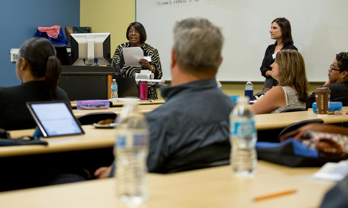 MSU faculty members addressing Flint teachers