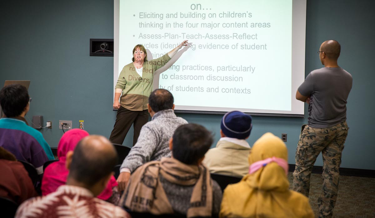 Corey Drake giving a presentation to Indonesian scholars